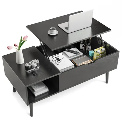 A black lift-top coffee table with a laptop, coffee cup, and decorative items on display.