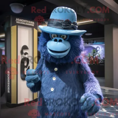 Image de Personnage mascotte REDBROKOLY d un gorille bleu habillé d une robe midi et d épingles à chapeau