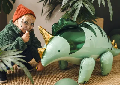Produktbild von Folienballon Dinosaurier Triceratops 93x49cm Grün