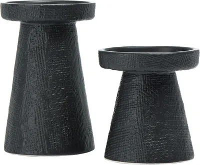Image de Ensemble de deux bougeoirs en céramique, de couleur blanche, pour salon et salle à manger