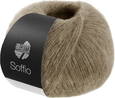 A ball of taupe colored yarn with a black label.