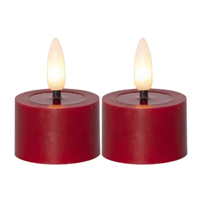 Two red LED candles with a 3D flame effect are shown against a white background.