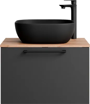 A black vessel sink and faucet are mounted on a wooden countertop above a gray cabinet.