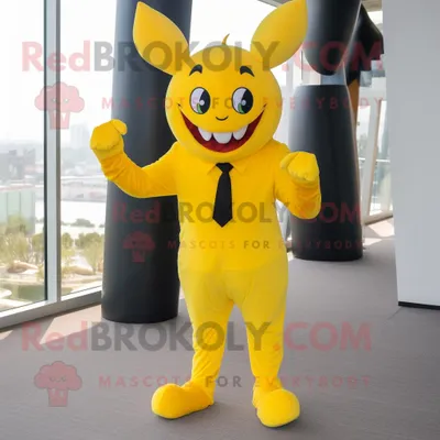 Immagine prodotto di Personaggio del costume della mascotte REDBROKOLY del diavolo giallo vestito con pantaloni da completo e cuscinetti per i piedi