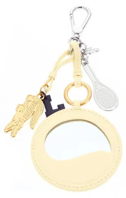 Produktbild von LACOSTE Schlüsselanhänger Mirror Racket Croc Charm Poussin hellgelb