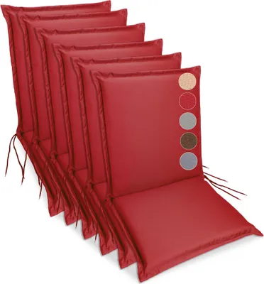 A stack of red chair cushions.