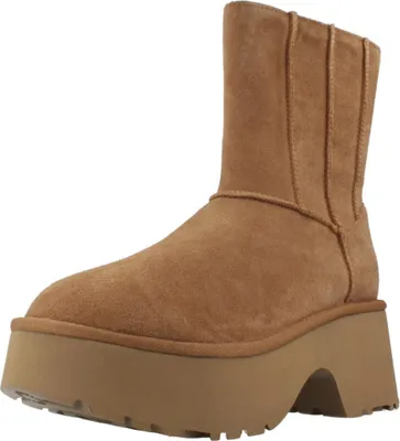 A single brown UGG boot with a platform sole is shown against a white background.