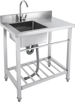 A stainless steel sink with a faucet and drainpipe, standing on a metal frame with a lower shelf.