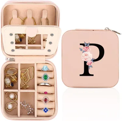 Imagen del producto de Caja de joyería Reisset con espejo, compacta, personalizable, ideal para guardar joyas cuando viajas