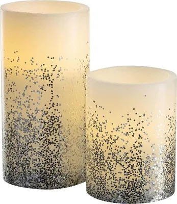 Two LED candles with glitter decoration.