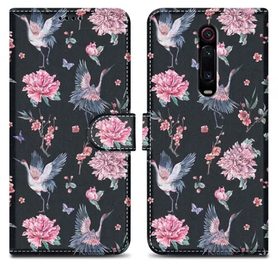 A black phone case with a floral and crane pattern.