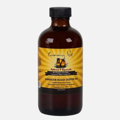 A bottle of Sunny Isle Jamaican Black Castor Oil against a light gray background.
