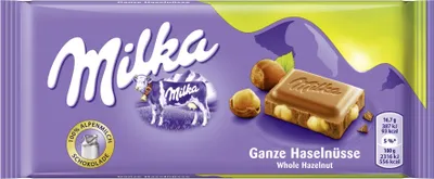 Produktbild von Milka Tafelschokolade Ganze Haselnüsse 100g, Milchschokolade, 100 g, Haselnuss, 2316 kJ, 556 kcal, 36 g