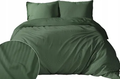 A green duvet cover and two pillowcases with a striped texture are displayed on a white background.