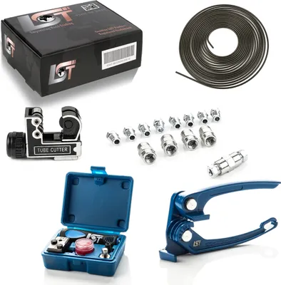 A collection of automotive brake line tools and materials, including a tube cutter, fittings, a bending tool, and a roll of brake line, arranged on a white background.