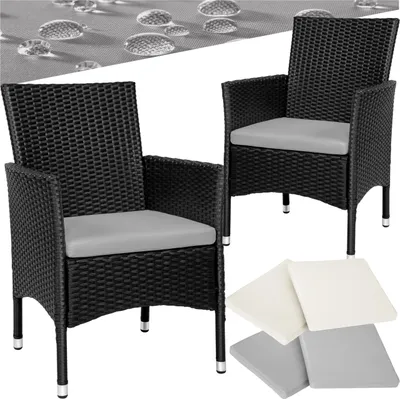 Two black rattan chairs with gray cushions are shown, along with separate cushions in white and gray.