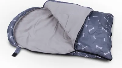 A dog sleeping bag is shown on a white background.