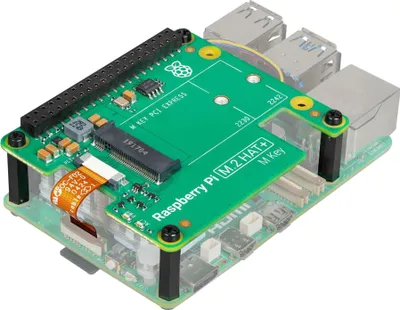 A Raspberry Pi 5 with an M.2 HAT+ attached, showing the connection ports.