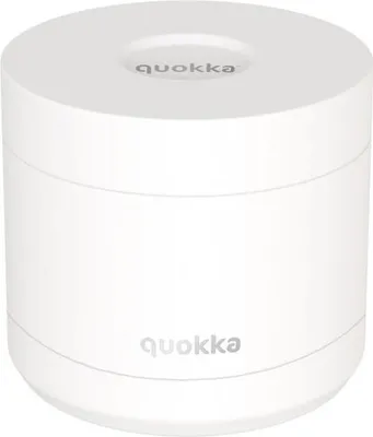 A white cylindrical food container with the brand name 'Quokka' visible on the top and side.