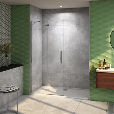 A modern bathroom with a glass shower enclosure.