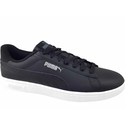 A black Puma sneaker with a white sole, shown from the side against a white background.