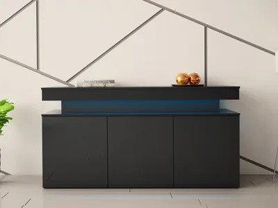 A modern black sideboard with LED lighting in a minimalist room.