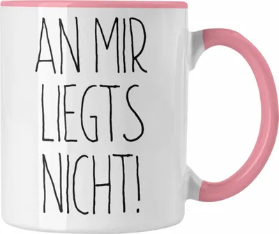 Produktbild von Trendation - An Mir Liegts Nicht Tasse Geschenk für Arbeit Büro Kollegen (Rosa)