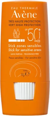 A product shot of an orange sunscreen stick.