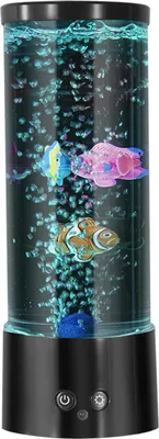 A cylindrical bubble lamp with artificial fish and blue gravel at the bottom, illuminated by internal LEDs.