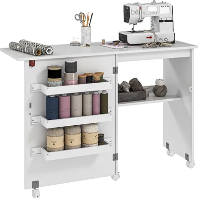 Image de HOMCOM Table de couture pliante meuble couture à abattant avec bacs de rangement, étagère ouverte et roulettes, meuble pour machine à coudre, pour salon, bureau, 117 x 40 x 77,5 cm, blanc