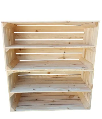 A wooden shelving unit with three shelves, made of wooden crates.