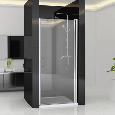 A modern bathroom with a glass shower enclosure.