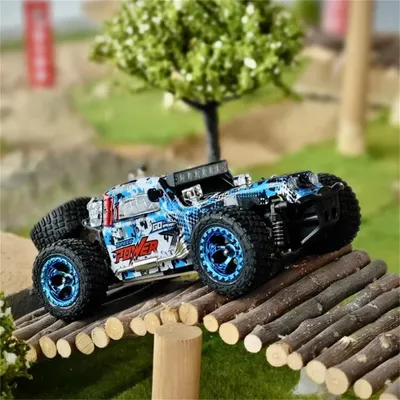 Immagine prodotto di Macchinina giocattolo - con 2 batterie - luci LED - telecomando - monster truck - 4x4 - 30 km/h