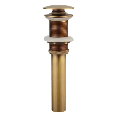 A close-up studio shot of a brass pop-up drain assembly for a sink, presented against a white background.