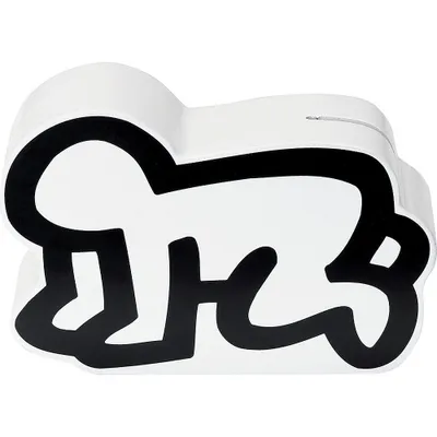 A white piggy bank shaped like a crawling baby, with a black outline in the style of Keith Haring.