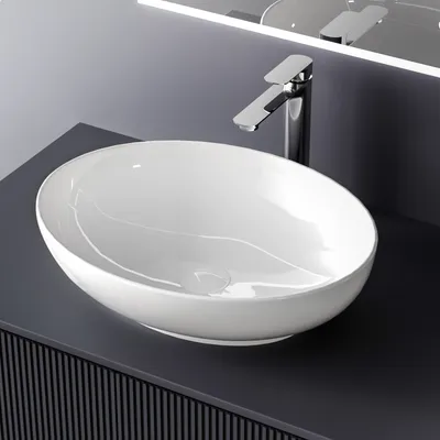 A modern bathroom sink and faucet.