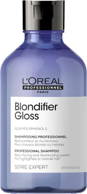 A bottle of L'Oréal Professionnel Blondifier Gloss shampoo.