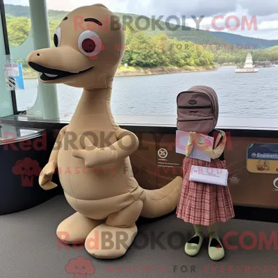 Imagen del producto de Personaje REDBROKOLY mascota de un monstruo del lago Ness color canela vestido con una minifalda y bolsos tipo mensajero