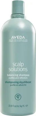 A bottle of Aveda Scalp Solutions Balancing Shampoo.