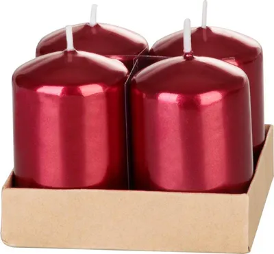Four red metallic-effect candles in a cardboard holder.