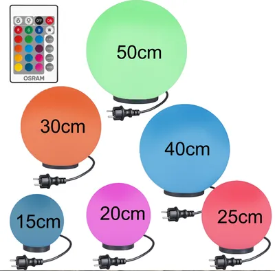 A collage of different sized spherical lamps in various colors, along with a remote control.
