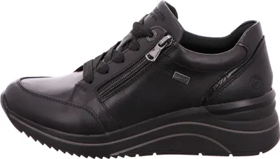 A side view of a black leather Remonte sneaker.