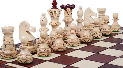 A close-up view of a chess set on a chessboard.