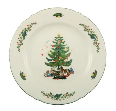 A Christmas-themed plate with a decorated tree and toys.