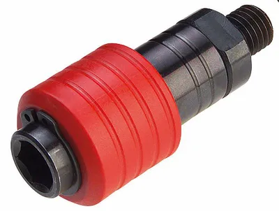 A close-up studio shot of a tool adapter with a red grip and black metal components against a white background.