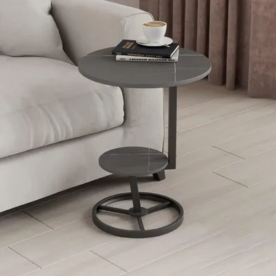 Immagine prodotto di Tavolino rotondo con spazio contenitivo e design elegante