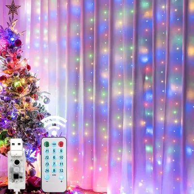 A decorated Christmas tree and a curtain with colorful LED lights, along with a remote control and a USB connector.