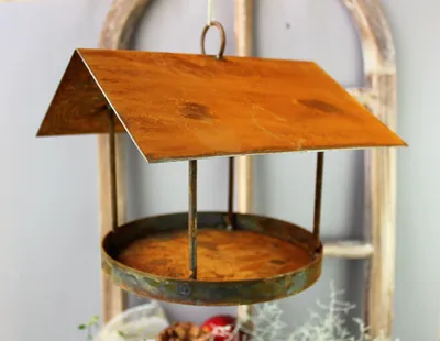 Image de Nichoir en métal élégant, avec un aspect rouillé, pour une utilisation en extérieur
