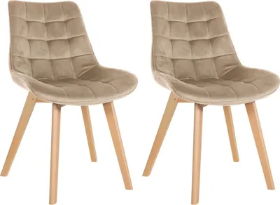 Two brown velvet chairs with wooden legs are shown against a white background.
