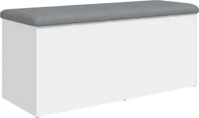 A white storage ottoman with a gray fabric lid.
